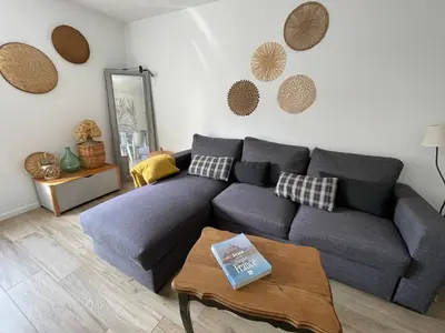 Coin salon dans l'établissement La Sereine - Appartement 2 chambres pour 4 personnes