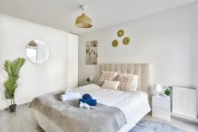 Un ou plusieurs lits dans un hébergement de l'établissement Cocon cosy 37m2 - Calme, confortable - Proche Lyon - Parking privé