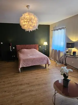 Un ou plusieurs lits dans un hébergement de l'établissement Gîte Côté Saône