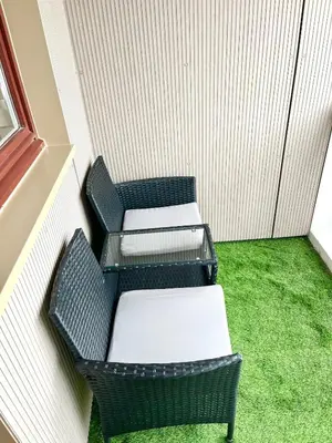 Coin salon dans l'établissement Cozy and Modern Apartment with View