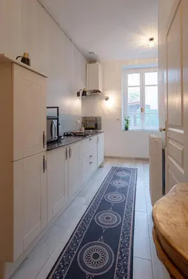 Cuisine ou kitchenette dans l'établissement Quiet studio with garden near Part-Dieu