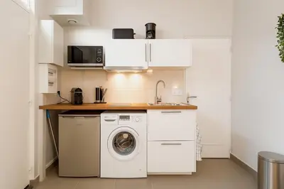 Cuisine ou kitchenette dans l'établissement SmartStay Studio - Jean-Mace