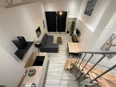 Coin salon dans l'établissement Duplex Moon x4 pers NEW - Gare Parilly