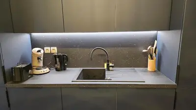 Cuisine ou kitchenette dans l'établissement Appartement proche Stade de Lyon, LDLC Arena, eurexpo, aéroport Saint exupéry
