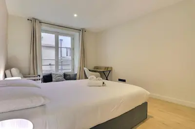 Un ou plusieurs lits dans un hébergement de l'établissement Prestige Apartment Lyon 2 6 guests - Place des Célestins
