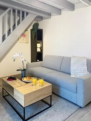 Coin salon dans l'établissement Maison de la Roche
