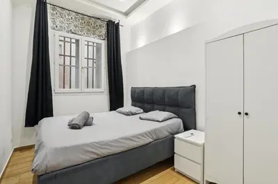 Un ou plusieurs lits dans un hébergement de l'établissement Superbe appartement en plein coeur de Lyon 1er