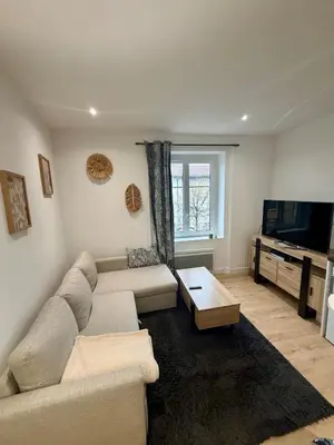 Télévision ou salle de divertissement dans l'établissement Harmony