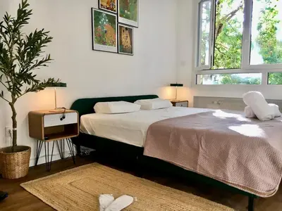Un ou plusieurs lits dans un hébergement de l'établissement Premium Comfort-2 Suites-Part-Dieu-Parking-Netflix