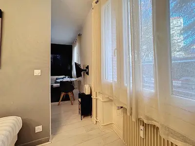 Un ou plusieurs lits dans un hébergement de l'établissement Le Studio Cosy Partdieu Villette