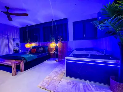 Un ou plusieurs lits dans un hébergement de l'établissement SERENITY Suite - Love room Amour