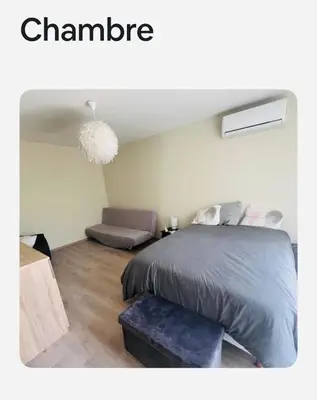 Un ou plusieurs lits dans un hébergement de l'établissement Maisonnette tout confort