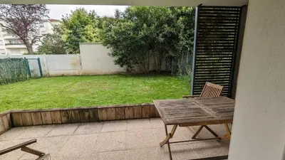 Jardin de l'établissement Bel appartement de standing Rdc, Terrasse, Parking sécurisé