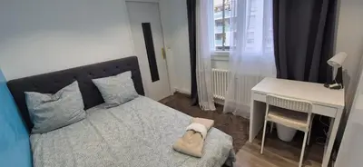 Un ou plusieurs lits dans un hébergement de l'établissement 3 chambres dans grand T4 Proche Lac, ENTPE, Planétarium & Autoroute