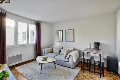 Coin salon dans l'établissement Chaleureux T2 à 15 min de Lyon