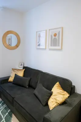 Coin salon dans l'établissement Suite de charme rénovée près de l Opéra de Lyon