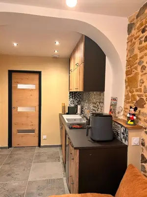 Cuisine ou kitchenette dans l'établissement BullyCosy