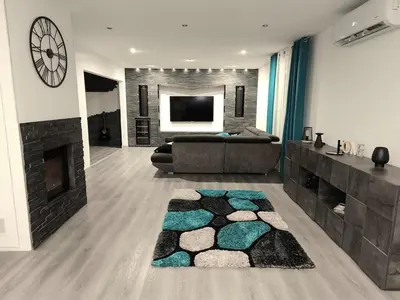 Télévision ou salle de divertissement dans l'établissement Le Cosy Five maison moderne