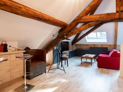 Coin salon dans l'établissement Appartements du Château GrandClément, entre Histoire & Modernité Cœur Métropole
