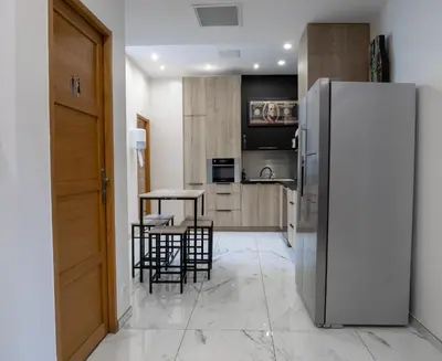Cuisine ou kitchenette dans l'établissement Appartements du Château GrandClément, entre Histoire & Modernité Cœur Métropole