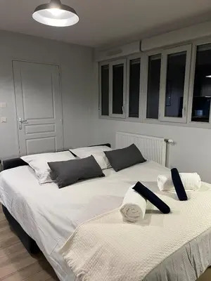 Un ou plusieurs lits dans un hébergement de l'établissement Charmant Studio Villeurbanne, Proche de Lyon