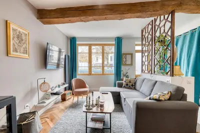 Coin salon dans l'établissement La Petite Maison Centrale - T4 - Centre Montluel