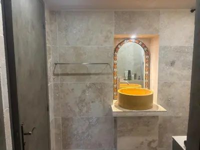 Salle de bains dans l'établissement Les collines de chandieu