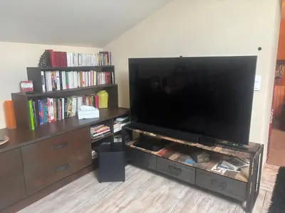 Télévision ou salle de divertissement dans l'établissement Les collines de chandieu