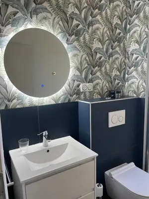 Salle de bains dans l'établissement La Roseraie