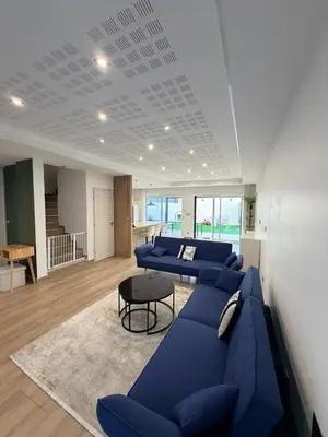 Coin salon dans l'établissement Villa de 120m2 avc jardin 3 chambres 8 Voyageurs