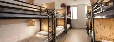 Un ou plusieurs lits dans un hébergement de l'établissement Le Flâneur Guesthouse