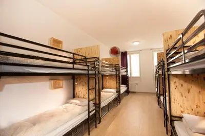 Un ou plusieurs lits dans un hébergement de l'établissement Le Flâneur Guesthouse