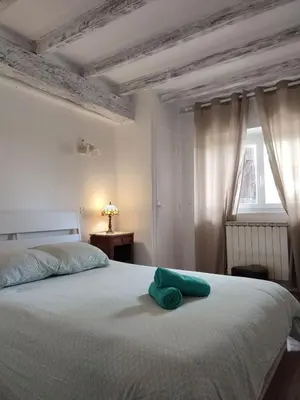 Un ou plusieurs lits dans un hébergement de l'établissement Appartement Vénus au coeur de la campagne