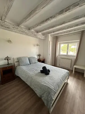 Un ou plusieurs lits dans un hébergement de l'établissement Appartement Vénus au coeur de la campagne