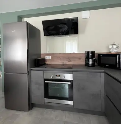 Cuisine ou kitchenette dans l'établissement Chez Audrey et Manu