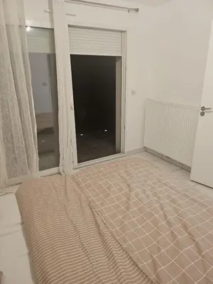 Un ou plusieurs lits dans un hébergement de l'établissement Maison confortable près de Lyon