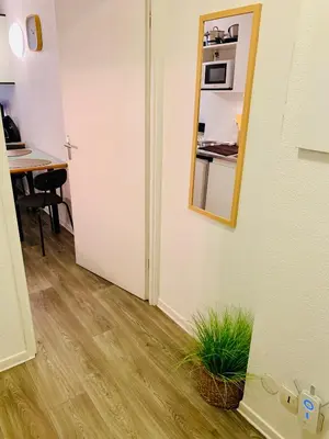 Cuisine ou kitchenette dans l'établissement Le Petit Central - 50m métro - tram