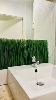 Salle de bains dans l'établissement Le Petit Central - 50m métro - tram