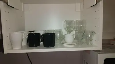 Cuisine ou kitchenette dans l'établissement Superbe studio Lyon 3 avec chambre et balcon