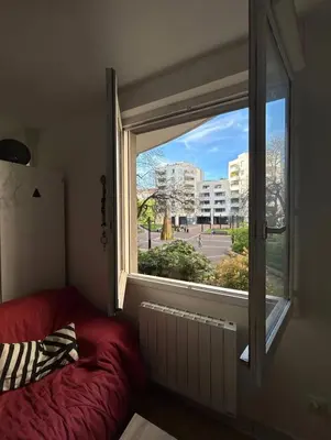 Un ou plusieurs lits dans un hébergement de l'établissement Appart lumineux Croix Rousse