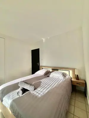Un ou plusieurs lits dans un hébergement de l'établissement Maison La Clairière - Jardin et parking - 10 pers - 4 chambres - 15 min de Lyon