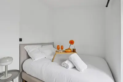 Un ou plusieurs lits dans un hébergement de l'établissement Superbe appartement, design & moderne en hypercentre
