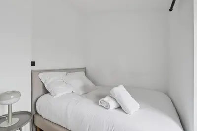 Un ou plusieurs lits dans un hébergement de l'établissement Superbe appartement, design & moderne en hypercentre