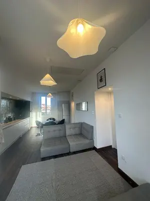 Coin salon dans l'établissement Appartement cosy à côté du métro