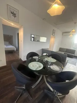 Coin salon dans l'établissement Appartement cosy à côté du métro