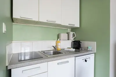 Cuisine ou kitchenette dans l'établissement Docks 66 - Proche gare de Vaise