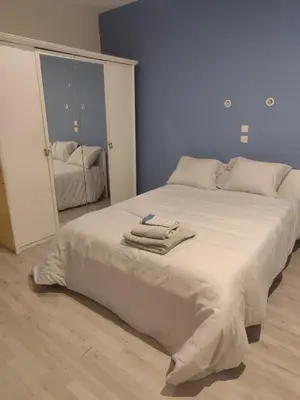Un ou plusieurs lits dans un hébergement de l'établissement Spacieux logement pour 5 personnes