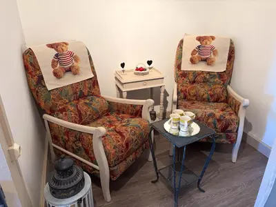 Coin salon dans l'établissement Les Chambres de MARIE