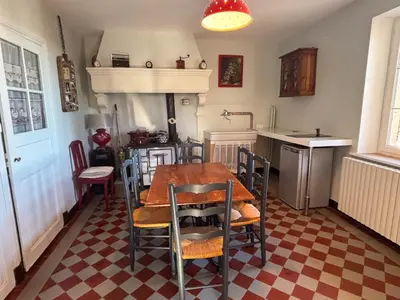 Cuisine ou kitchenette dans l'établissement Les Chambres de MARIE