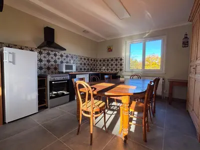 Cuisine ou kitchenette dans l'établissement Les Chambres de MARIE